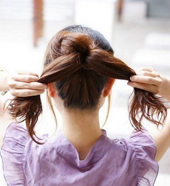 2011瘦臉的發(fā)型-散發(fā)浪漫氣息的花苞頭