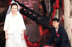 靳東家庭背景不一般 網(wǎng)曝靳東李佳結(jié)婚照