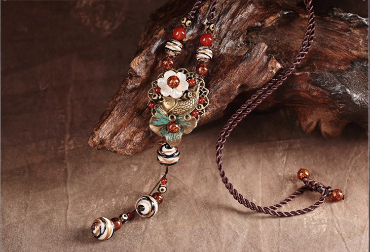 復(fù)古風琉璃吊墜毛衣鏈,魚影風銷項鏈