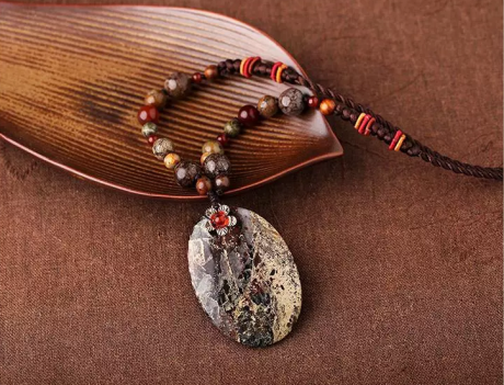 花紅吊墜時(shí)尚匠心啟航閱讀項(xiàng)鏈?zhǔn)罪楅L(zhǎng)款毛衣鏈